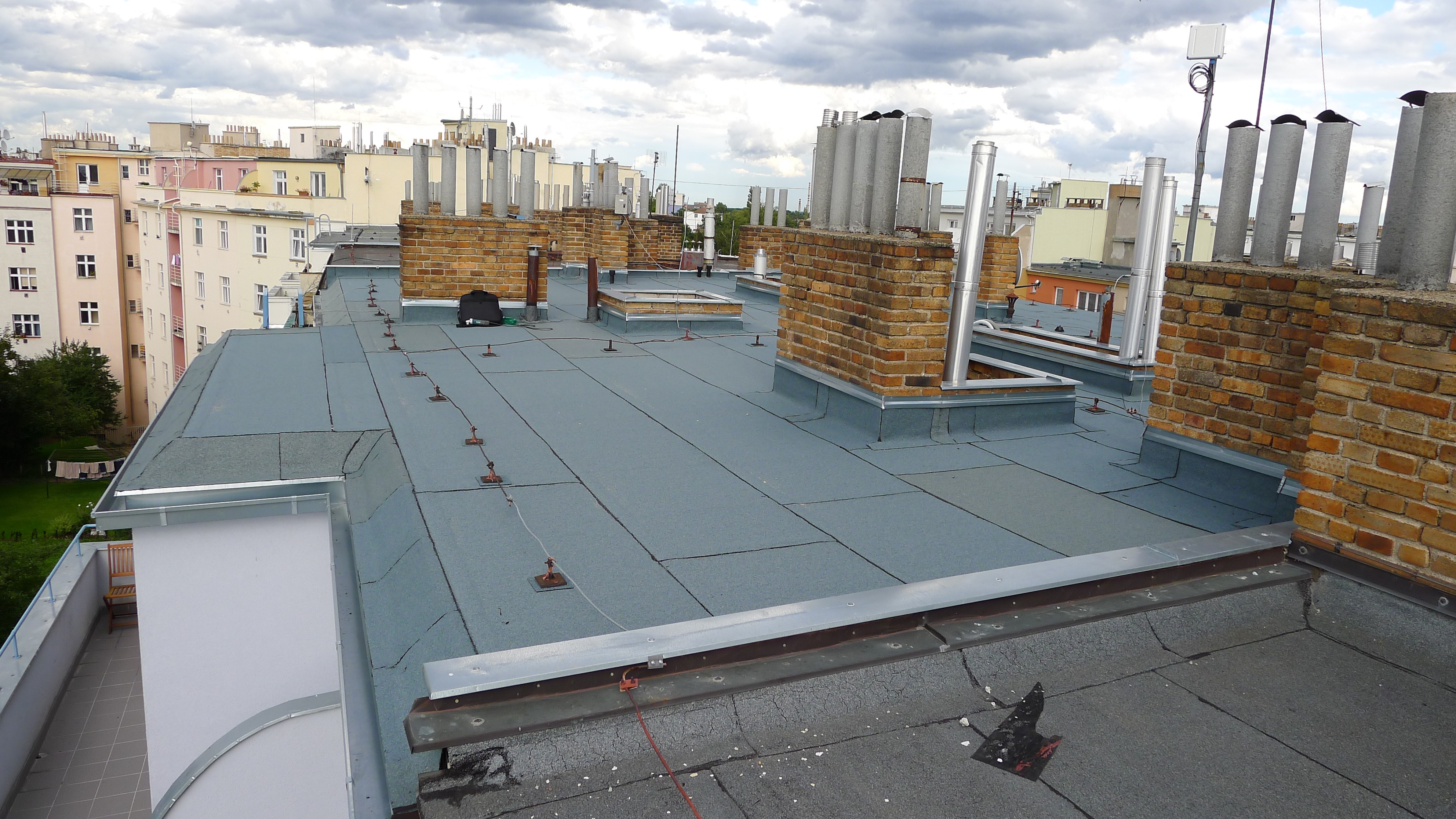 Oprava hydroizolace ploché střechy a výměna klempířských prvků